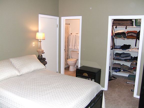Masterbedroom features full bath and walk in closet