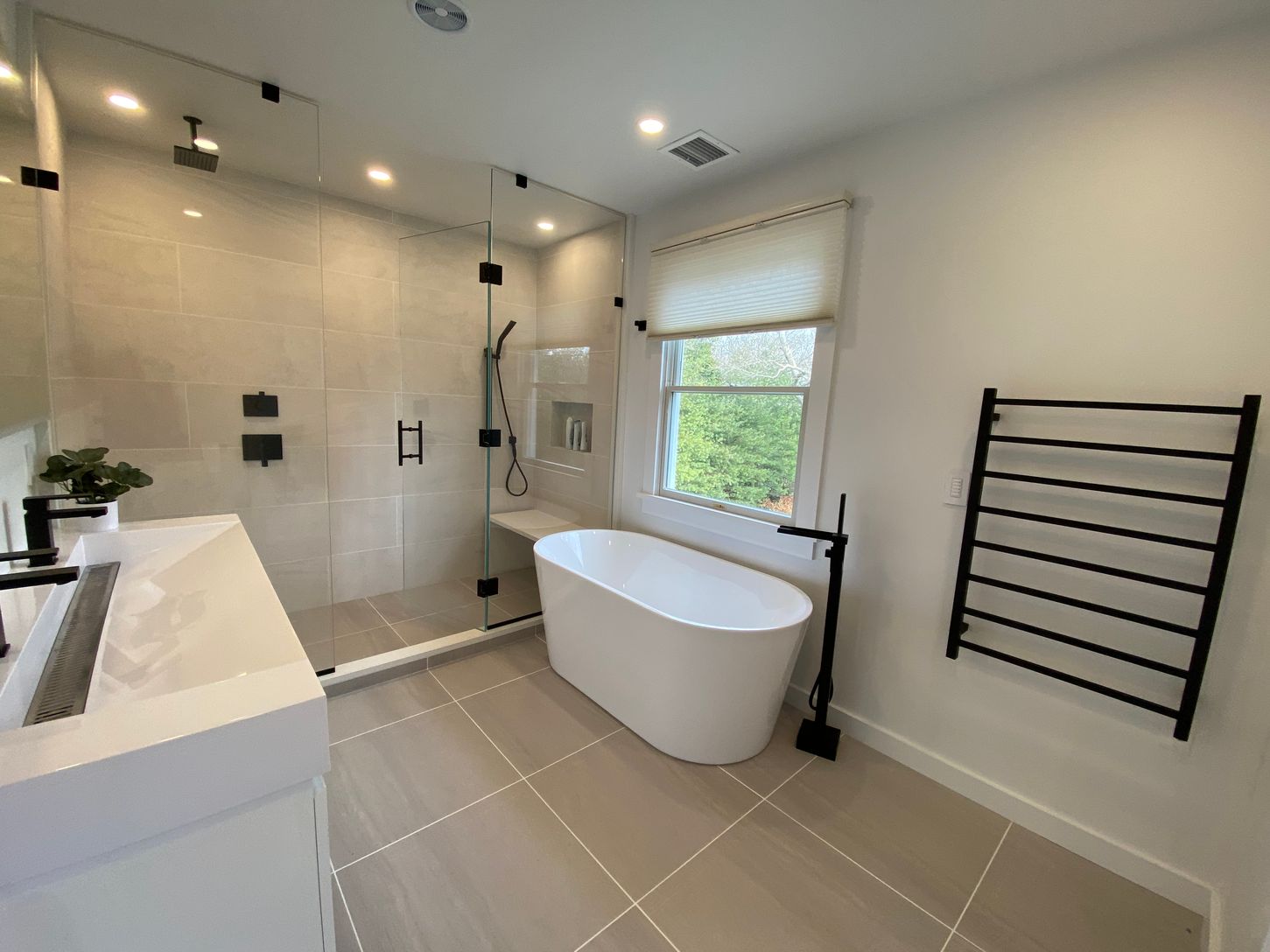  Primary en-suite  bathroom on the 2nd floor . Large soaking tub and a spa walk-in shower