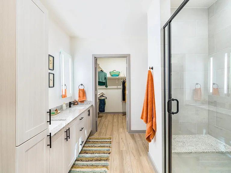 Unwind in our designer bathrooms, complete with quartz countertops and backlit mirrors.