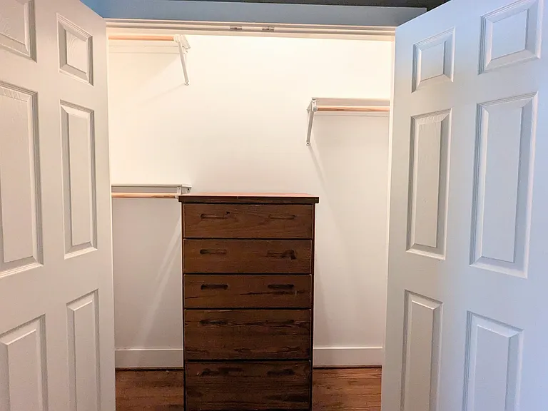 1 of 2 closets in primary bedroom