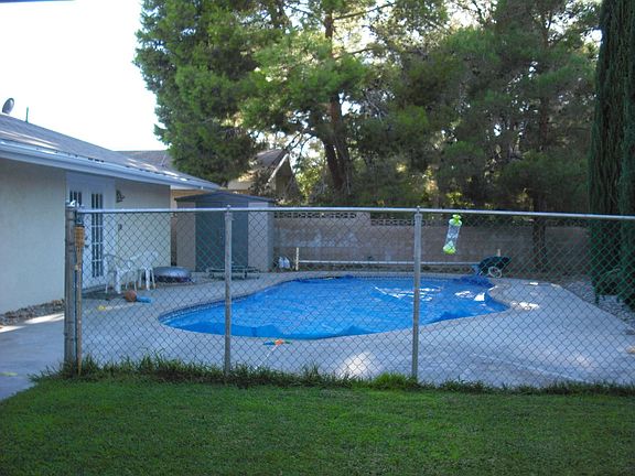 Fenced pool area in back