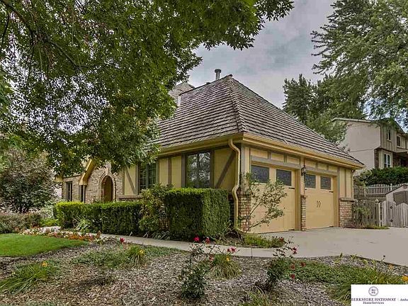 New insulated garage doors with windows.  Garage is very well lit during the day