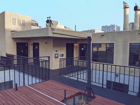 From the deck looking towards the elevator on the far left, stairway door and the front door to 501,