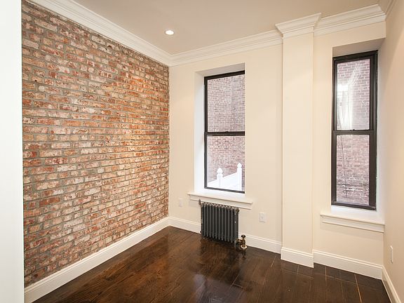 3rd image of 50 E 3rd St APT 1C