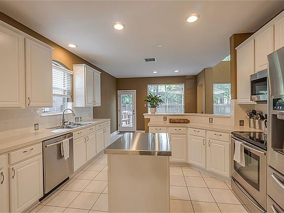Recent appliances in this light and bright kitchen! Refrigerator stays.