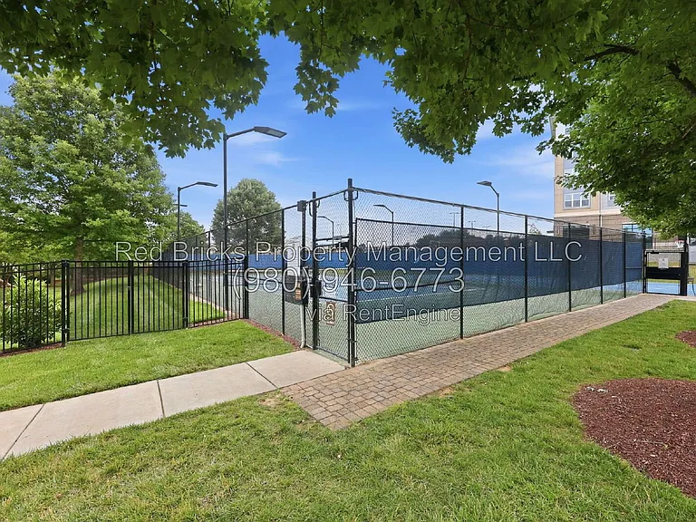 9659 Camberley Ave NW — Photo 44