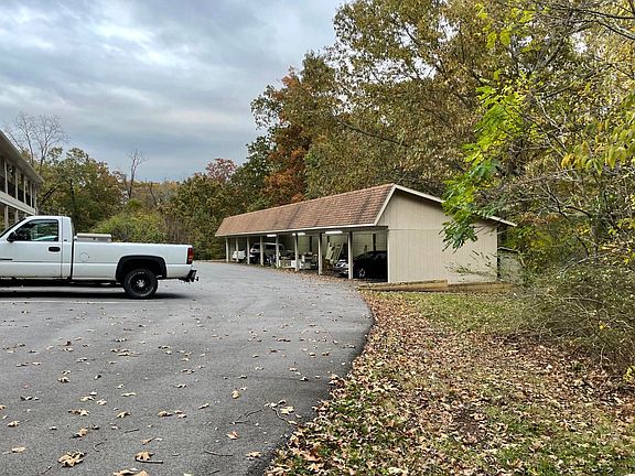 One covered carport parking space is provided for each unit.