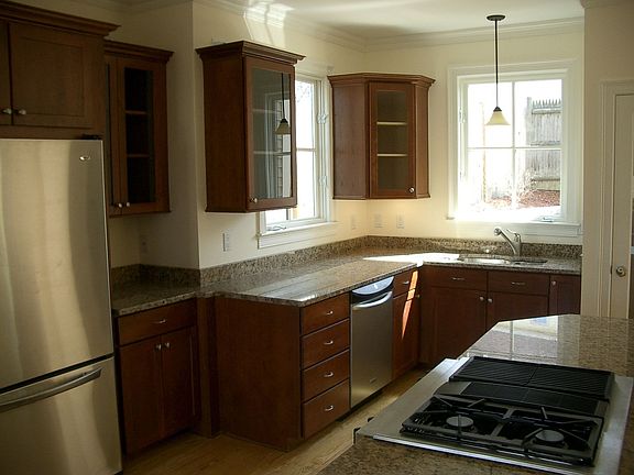 Full equipped kitchen with granite counters and stainless steel appliances
