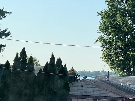 View of the lake over house tops