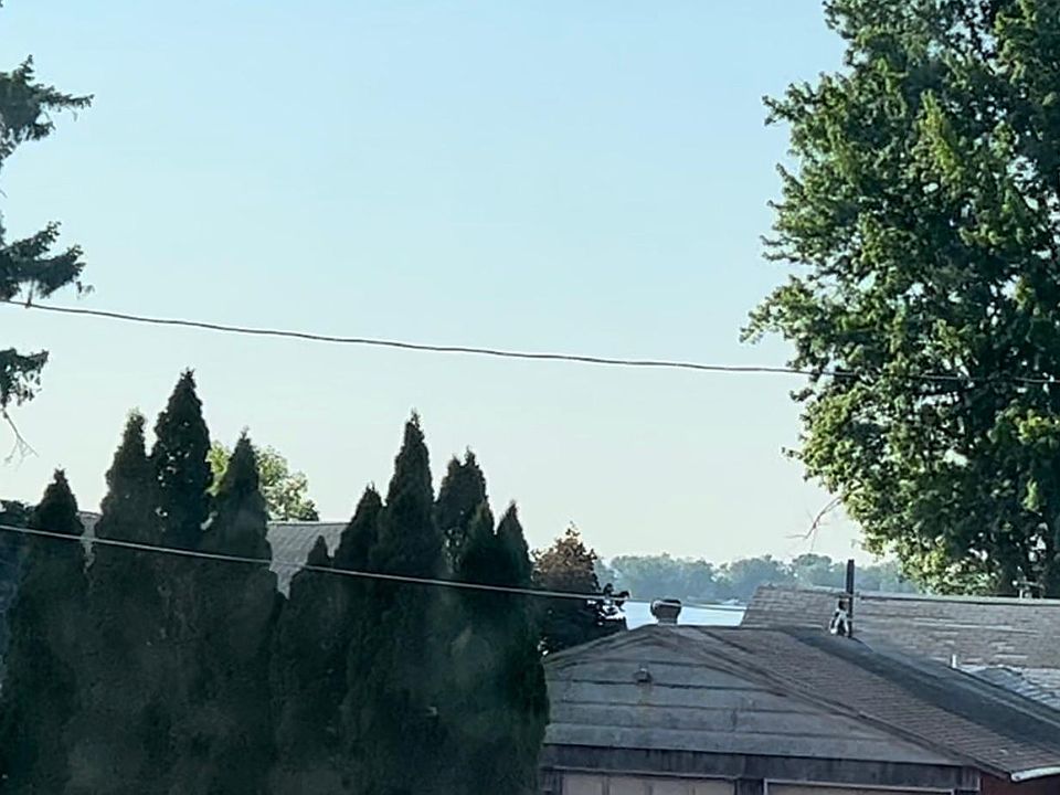 View of the lake over house tops