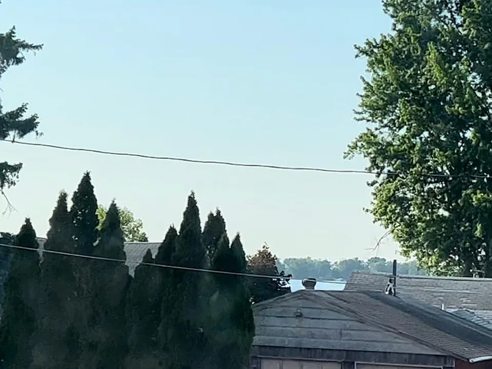 View of the lake over house tops