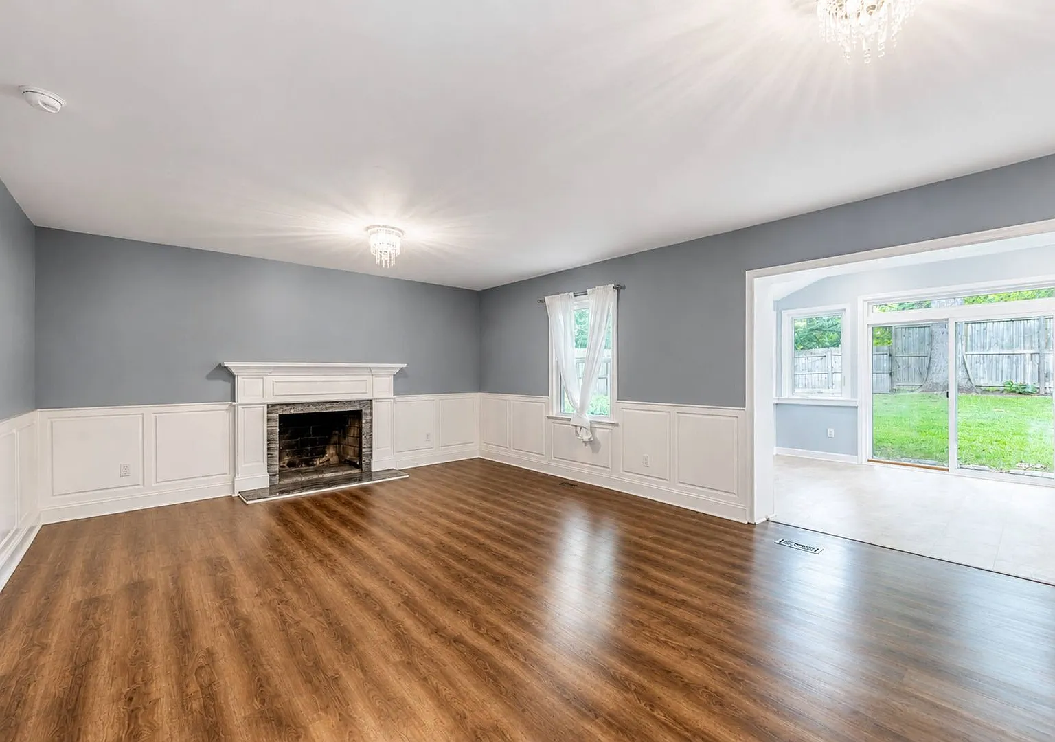 Large fenced in yard and Sun room! — Photo 3
