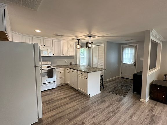 Kitchen with laundry closet