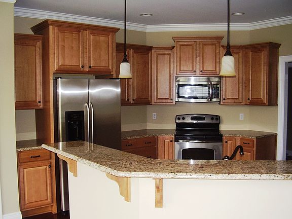 EAT IN KITCHEN W/GRANITE,HARDWOOD, & STAINLESS APPLIANCES