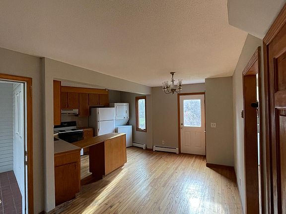 Looking out to the dinning and kitchen area of the unit.