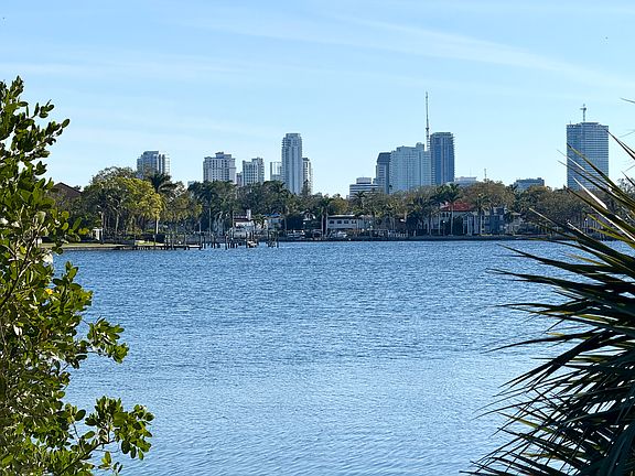 Waterfront with downtown and water views