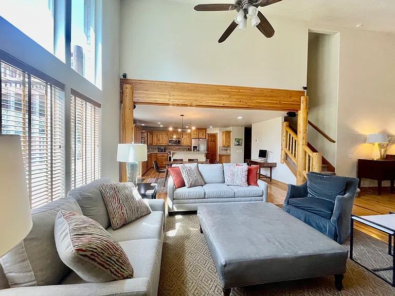 Can seat many people in large living room which opens up to kitchen for those fun game watches and family gathering