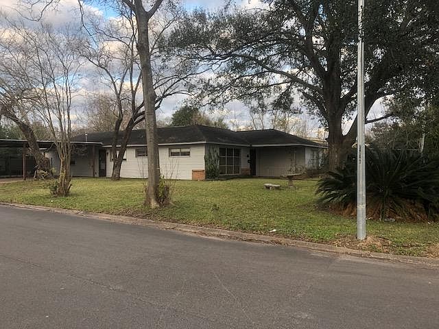 View from street corner. House is set far back from the street!
