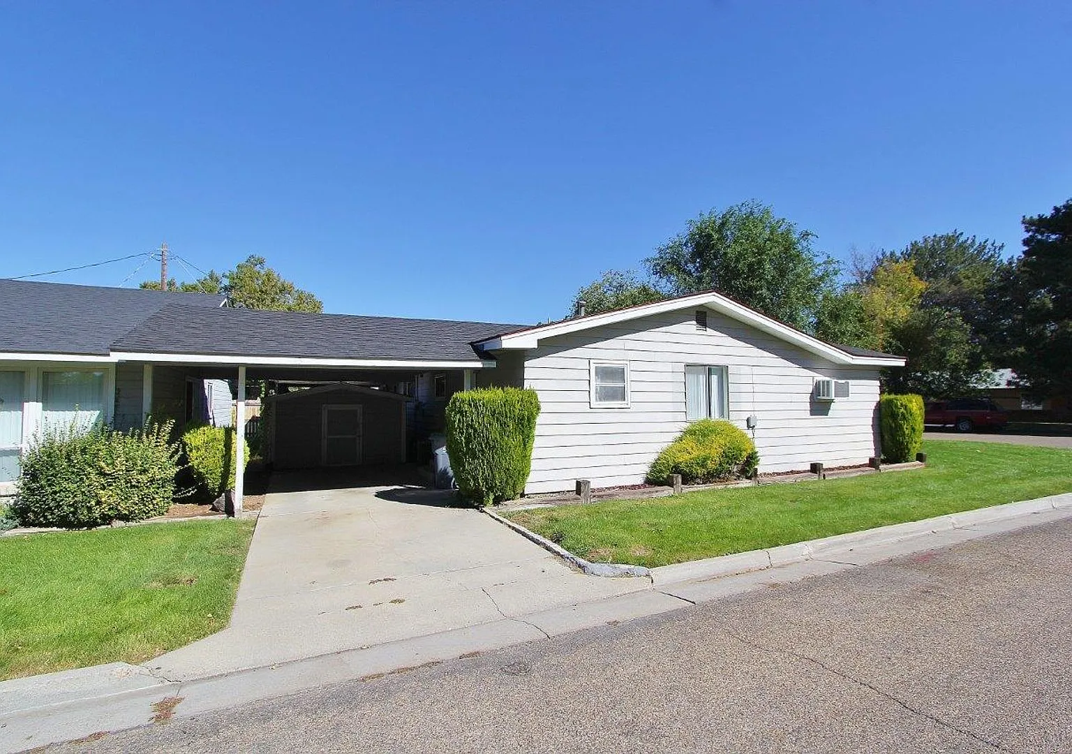 Quaint Single-Level Unit on Corner-Lot — Photo 1