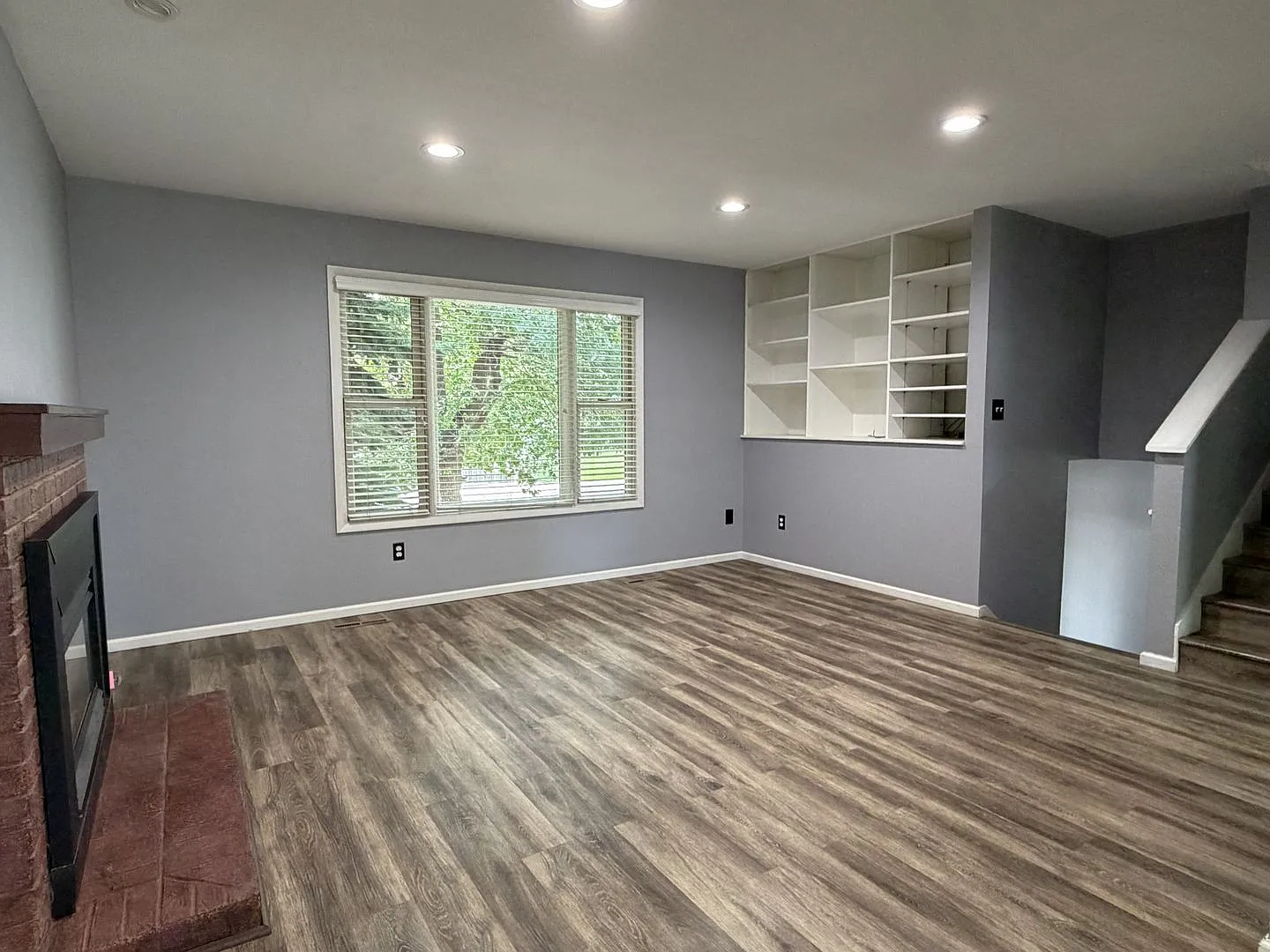Spacious 3 Bed Home in Fort Collins | Fenced Yard, Fireplace & Finished Basement — Photo 2