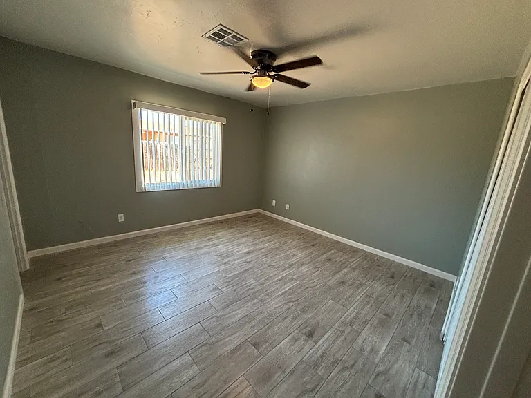 4 Bedrooms total. Each has a closet and ceiling fan.