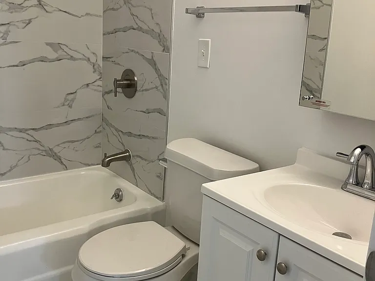 Bathroom on 1st floor. Light, bright & just redone.