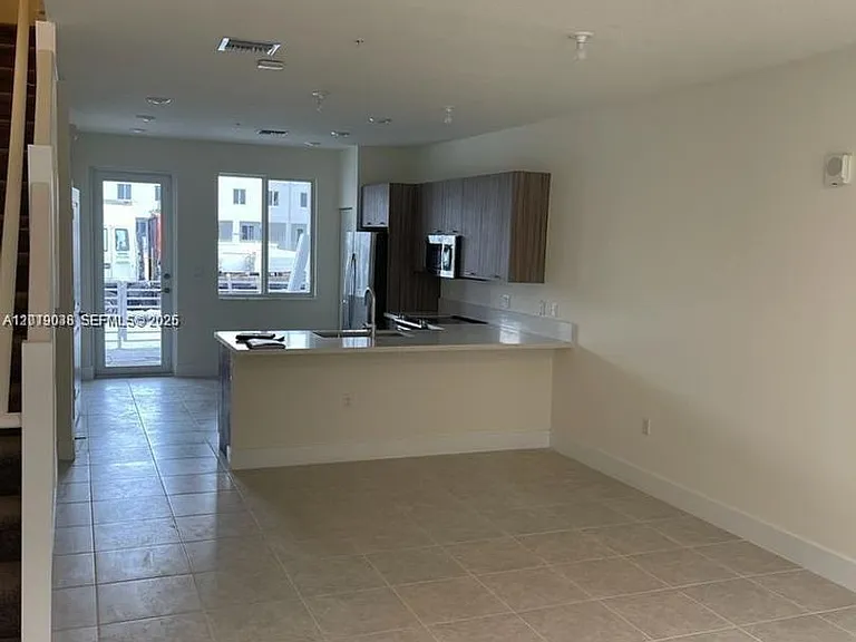 6450 NW 102nd Path #107 — Photo 3