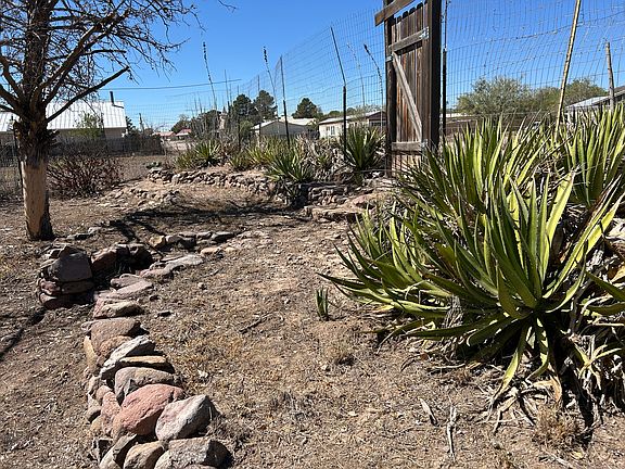 This is a 3rd pedestrian gate on the west end of the property.