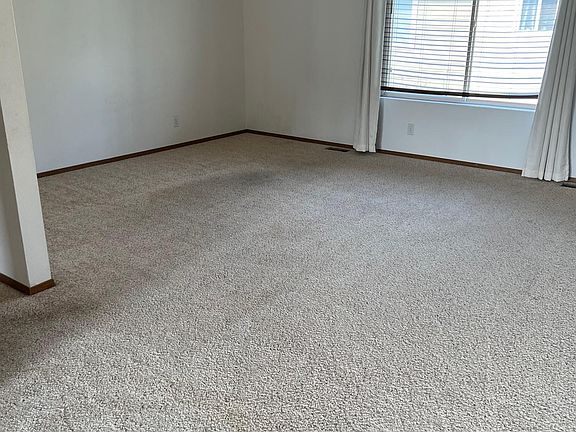 Living room with vaulted ceiling