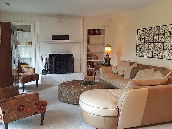 Double sliding doors to the patio make this great for entertaining.