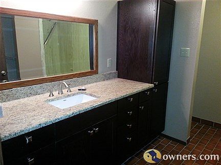 Remodeled master bath with granite counter tops and garden tub