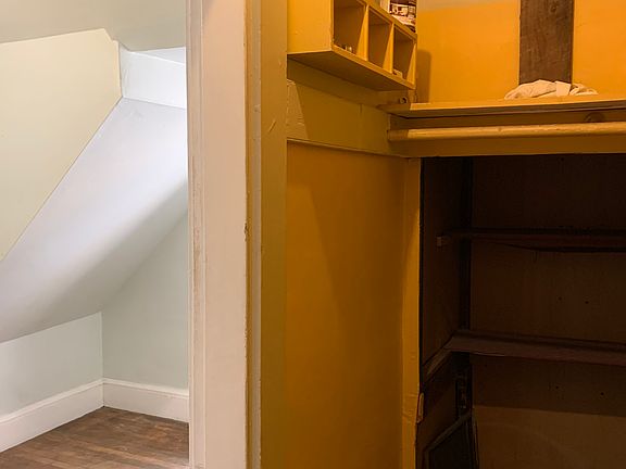 Other end of Walk-in Closet has a secret compartment (old Victorian era food dolly?)