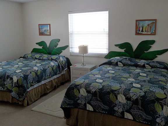 2 queen pillow-top beds in large bedroom