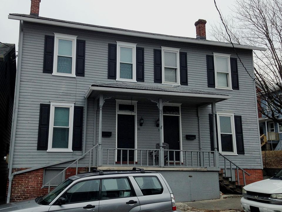 Exterior of home; left side currently for rent.