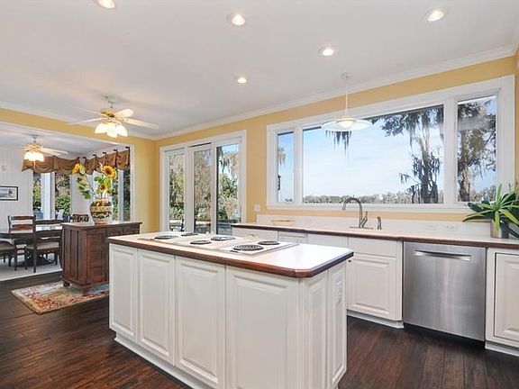 Double island kitchen with picture windows