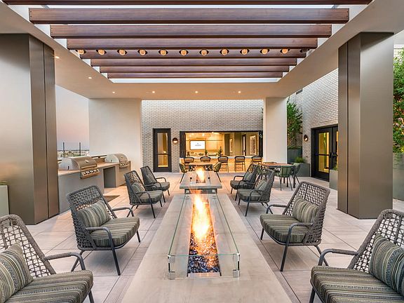 Take in the mountain views and relax by the firepits_this rooftop offers a peaceful place to unwind.