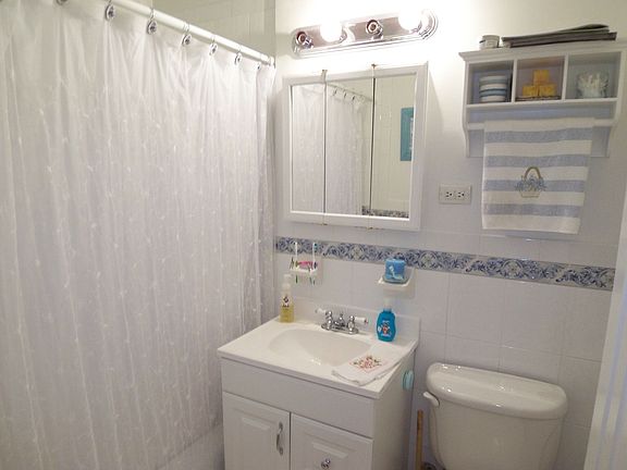 New Ceramic Tiled Bathroom