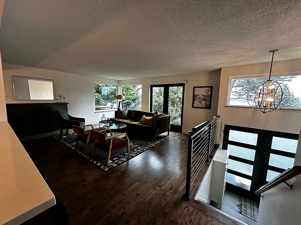 View from kitchen towards water. Hallway on R to bathrooms and bedrooms.
