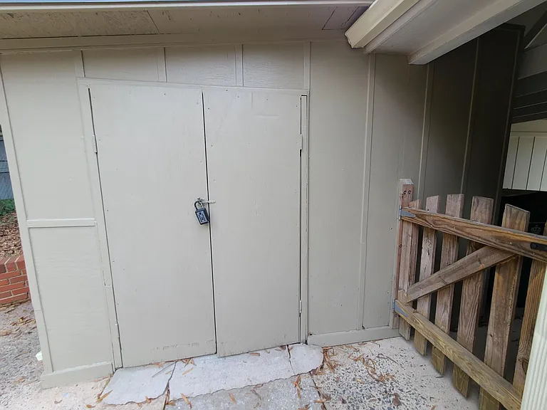 Plenty of room in the storage area beside the back patio and carport.