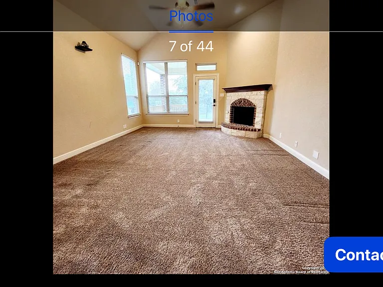 Family room adjoining the kitchen. Functional gas fireplace for added heat in the winter or for ambiance.