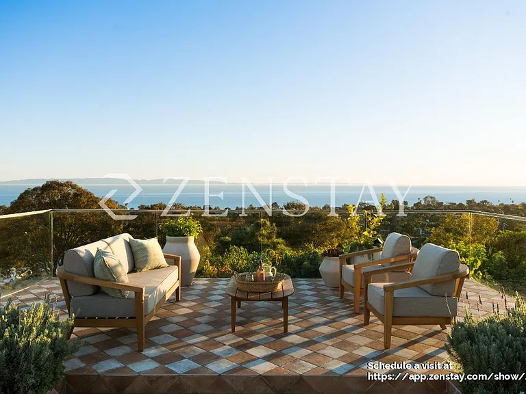 Outdoor seating area ideal for relaxing, dining, and entertaining year-round