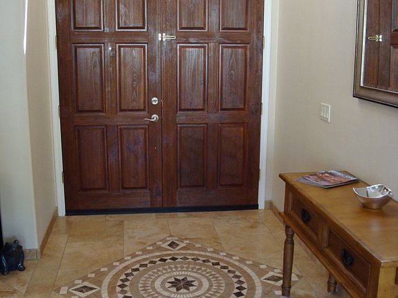 Gorgeous 4x4 natural travertine stone medallion in entryway
