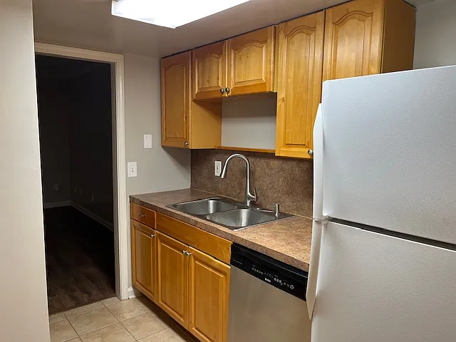Sink/Refer side of galley kitchen