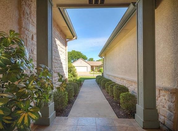 Slate-like tile blankets the Front Porch.