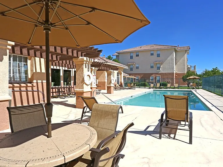 Lovely pool deck with seating
