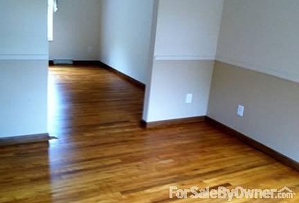 Dining Room into Living Room
						:
						All rooms freshly painted; floors restored