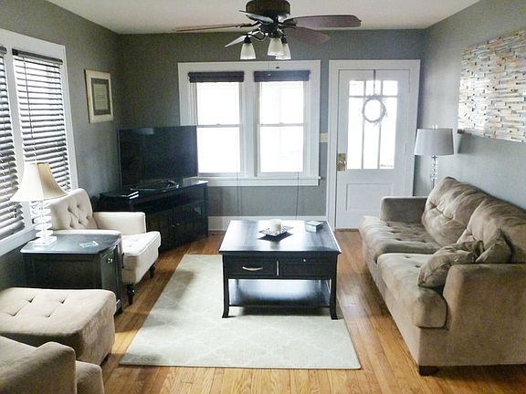 Natural light abounds in the Living Room. Gorgeous wood flooring throughout the main level.