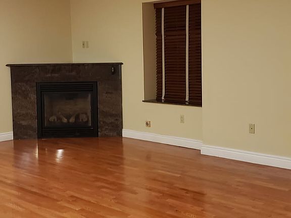 Granite FirePlace- Hardwood Floors