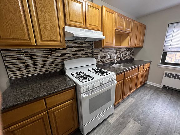 pictures of different apartment with similar layout. bedroom and living room are carpeted.