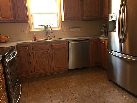 Kitchen
						:
						New stainless steel range/ oven, microwave, dishwasher, and fridge!